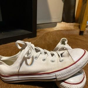 Gently used white cloth chucks